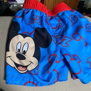 Mickey Mouse bathing shit